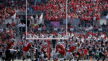 Ohio State Buckeyes quarterback C.J. Stroud (7) scrambles during the third quarter of a NCAA Division I football game between the Ohio State Buckeyes and the Maryland Terrapins on Saturday, Oct. 9, 2021 at Ohio Stadium in Columbus, Ohio.Cfb Maryland Terrapins At Ohio State Buckeyes