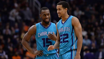 Jan 6, 2016; Phoenix, AZ, USA; Charlotte Hornets guard Brian Roberts (22) talks to guard Kemba Walker (15) in the second half against the Phoenix Suns at Talking Stick Resort Arena. The Suns won 111-102. Mandatory Credit: Jennifer Stewart-USA TODAY Sports