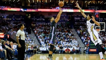 Oct 31, 2015; New Orleans, LA, USA; Golden State Warriors guard Stephen Curry (30) shoots over New Orleans Pelicans forward Anthony Davis (23) during the first quarter of a game at Smoothie King Center. Mandatory Credit: Derick E. Hingle-USA TODAY Sports
