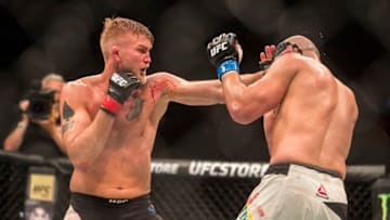 STOCKHOLM, SWEDEN - MAY 28: Alexander Gustafsson punches Golver Teixeira during the UFC Fight Night event at Ericsson Globe on May 28, 2017 in Stockholm, Sweden. (Photo by Michael Campanella/Getty Images)