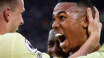 Arsenal's Brazilian defender Gabriel (R) celebrates with teammates after scoring a goal during the English Premier League football match between West Ham United and Arsenal at the London Stadium, in London on May 1, 2022. - - RESTRICTED TO EDITORIAL USE. No use with unauthorized audio, video, data, fixture lists, club/league logos or 'live' services. Online in-match use limited to 45 images, no video emulation. No use in betting, games or single club/league/player publications. (Photo by Ian Kington / IKIMAGES / AFP) / RESTRICTED TO EDITORIAL USE. No use with unauthorized audio, video, data, fixture lists, club/league logos or 'live' services. Online in-match use limited to 45 images, no video emulation. No use in betting, games or single club/league/player publications. / RESTRICTED TO EDITORIAL USE. No use with unauthorized audio, video, data, fixture lists, club/league logos or 'live' services. Online in-match use limited to 45 images, no video emulation. No use in betting, games or single club/league/player publications. (Photo by IAN KINGTON/IKIMAGES/AFP via Getty Images)