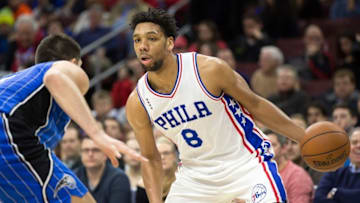 Feb 23, 2016; Philadelphia, PA, USA; Philadelphia 76ers center Jahlil Okafor (8) attempts to drive past the defense of Orlando Magic center Nikola Vucevic (9) during the first half at Wells Fargo Center. Mandatory Credit: Bill Streicher-USA TODAY Sports
