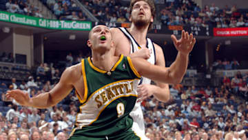 MEMPHIS, TN - NOVEMBER 8: Vitaly Potapenko #9 of the Seattle SuperSonics guards Pau Gasol #16 of the Memphis Grizzlies on November 8, 2005 at FedexForum in Memphis, Tennessee. NOTE TO USER: User expressly acknowledges and agrees that, by downloading and or using this photograph, User is consenting to the terms and conditions of the Getty Images License Agreement. Mandatory Copyright Notice: Copyright 2005 NBAE (Photo by Joe Murphy/NBAE via Getty Images)