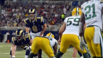 Aug 16, 2014; St. Louis, MO, USA; St. Louis Rams quarterback Sam Bradford (8) at the line of scrimmage against the Green Bay Packers during the first half at Edward Jones Dome. Mandatory Credit: Jasen Vinlove-USA TODAY Sports