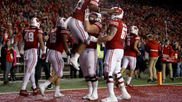 MADISON, WI - OCTOBER 06: Jonathan Taylor #23 of the Wisconsin Badgers celebrates with teammates after scoring a touchdown in the third quarter against the Nebraska Cornhuskers at Camp Randall Stadium on October 6, 2018 in Madison, Wisconsin. (Photo by Dylan Buell/Getty Images)