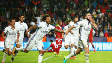 TRONDHEIM, NORWAY - AUGUST 09: Dani Carvajal of Real Madrid celebrates scoring his team's third goal with Marcelo during the UEFA Super Cup match between Real Madrid and Sevilla at Lerkendal Stadion on August 9, 2016 in Trondheim, Norway. (Photo by Christopher Lee - UEFA/UEFA via Getty Images)