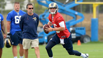 Jun 14, 2016; Oxnard, CA, USA; Los Angeles Rams head coach Jeff Fisher watches quarterback Jared Goff (16) make a pass during minicamp workouts at River Ridge Fields. Mandatory Credit: Jayne Kamin-Oncea-USA TODAY Sports