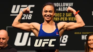 DETROIT, MI - DECEMBER 01: Michelle Waterson poses on the scale during the UFC 218 weigh-in inside Little Caesars Arena on December 1, 2017 in Detroit, Michigan. (Photo by Josh Hedges/Zuffa LLC/Zuffa LLC via Getty Images)