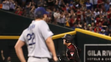 PHOENIX, ARIZONA - AUGUST 31: Wilmer Flores #41 of the Arizona Diamondbacks rounds the bases after hitting a solo home run against starting pitcher Clayton Kershaw #22 of the Los Angeles Dodgers during the fourth inning of the MLB game at Chase Field on August 31, 2019 in Phoenix, Arizona. (Photo by Christian Petersen/Getty Images)