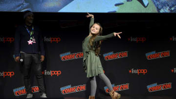 NEW YORK, NEW YORK - OCTOBER 05: Cailey Fleming dances on stage as AMC presents a special advanced screening of the Season 10 premier of 'The Walking Dead' at Hulu Theater at Madison Square Garden on October 05, 2019 in New York City. (Photo by Jamie McCarthy/Getty Images for AMC)