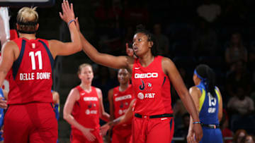 WASHINGTON, DC - SEPTEMBER 6: Ariel Atkins #7 of the Washington Mystics high-fives Elena Delle Donne #11 of the Washington Mystics against the Dallas Wings on September 6, 2019 at the St. Elizabeths East Entertainment and Sports Arena in Washington, DC. NOTE TO USER: User expressly acknowledges and agrees that, by downloading and or using this photograph, User is consenting to the terms and conditions of the Getty Images License Agreement. Mandatory Copyright Notice: Copyright 2019 NBAE (Photo by Ned Dishman/NBAE via Getty Images)