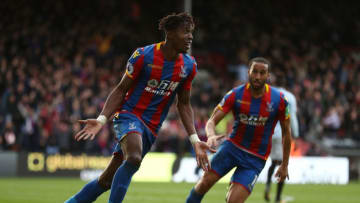 LONDON, ENGLAND - OCTOBER 28: Wilfried Zaha of Crystal Palace celebrates scoring his sides second goal with Andros Townsend of Crystal Palace during the Premier League match between Crystal Palace and West Ham United at Selhurst Park on October 28, 2017 in London, England. (Photo by Bryn Lennon/Getty Images)