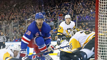 NEW YORK, NEW YORK - MARCH 16: Chris Kreider #20 of the New York Rangers scores the game winning goal against the Pittsburgh Penguins during the third period at Madison Square Garden on March 16, 2023 in New York City. The Rangers defeated the Penguins 5-3. (Photo by Bruce Bennett/Getty Images)