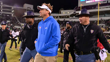 Nov 25, 2021; Starkville, Mississippi, USA; Mississippi Rebels head coach Lane Kiffin walks off the field after the game against the Mississippi State Bulldogs at Davis Wade Stadium at Scott Field. Mandatory Credit: Matt Bush-USA TODAY Sports