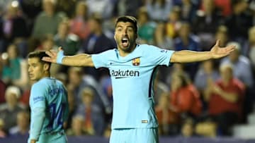 Barcelona's Uruguayan forward Luis Suarez gestures during the Spanish league football match between Levante and Barcelona at the Ciutat de Valencia stadium in Valencia on May 13, 2018. (Photo by JOSE JORDAN / AFP) (Photo credit should read JOSE JORDAN/AFP/Getty Images)