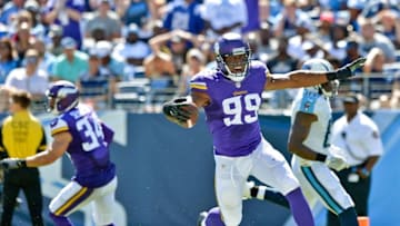 Sep 11, 2016; Nashville, TN, USA; Minnesota Vikings defensive end Danielle Hunter (99) picks up a Tennessee Titans fumble and runs for a touchdown during the second half at Nissan Stadium. Minnesota won 25-16. Mandatory Credit: Jim Brown-USA TODAY Sports