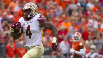 Nov 7, 2015; Clemson, SC, USA; Florida State Seminoles running back Dalvin Cook (4) carries for a touchdown during the first quarter against the Clemson Tigers at Clemson Memorial Stadium. Mandatory Credit: Joshua S. Kelly-USA TODAY Sports