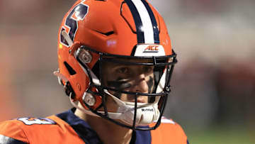RALEIGH, NORTH CAROLINA - OCTOBER 10: Tommy DeVito #13 of the Syracuse Orange warms up before their game against the North Carolina State Wolfpack at Carter Finley Stadium on October 10, 2019 in Raleigh, North Carolina. (Photo by Streeter Lecka/Getty Images)