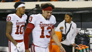 Auburn footballNov 27, 2021; Stillwater, Oklahoma, USA; Oklahoma Sooners quarterback Caleb Williams (13) walks off the field after a loss to the Oklahoma State Cowboys at Boone Pickens Stadium. Oklahoma State won 37-33. Mandatory Credit: Alonzo Adams-USA TODAY Sports