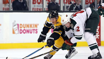 Oct 25, 2016; Boston, MA, USA; Boston Bruins center Noel Acciari (55) and Minnesota Wild center Eric Staal (12) battle for the puck during the first period at TD Garden. Mandatory Credit: Winslow Townson-USA TODAY Sports
