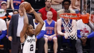 Mar 2, 2016; San Antonio, TX, USA; San Antonio Spurs small forward Kawhi Leonard (2) dunks the ball against the Detroit Pistons during the second half at AT&T Center. Mandatory Credit: Soobum Im-USA TODAY Sports