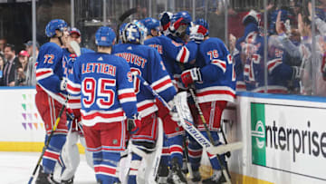 NEW YORK, NY - OCTOBER 11: The New York Rangers celebrate after a game winning goal in overtime by Brady Skjei #76 against the San Jose Sharks at Madison Square Garden on October 11, 2018 in New York City. (Photo by Jared Silber/NHLI via Getty Images)