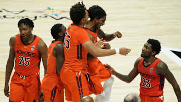 Nov 28, 2020; Uncasville, Connecticut, USA; Virginia Tech Hokies guard Cartier Diarra (2) and his teammates react after a play against the Villanova Wildcats in the second half at Mohegan Sun Arena. Mandatory Credit: David Butler II-USA TODAY Sports