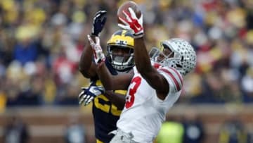 Nov 28, 2015; Ann Arbor, MI, USA; Ohio State Buckeyes wide receiver Michael Thomas (3) makes a catch over Michigan Wolverines cornerback Jourdan Lewis (26) in the third quarter at Michigan Stadium. Mandatory Credit: Rick Osentoski-USA TODAY Sports