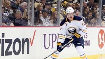 Mar 29, 2016; Pittsburgh, PA, USA; Buffalo Sabres center Jack Eichel (15) handles the puck against the Pittsburgh Penguins during the first period at the CONSOL Energy Center. The Penguins won 5-4 in a shootout. Mandatory Credit: Charles LeClaire-USA TODAY Sports