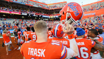 GAINESVILLE, FLORIDA - SEPTEMBER 28: Kyle Trask #11 of the Florida Gators celebrates with his team after a game against the Towson Tigers at Ben Hill Griffin Stadium on September 28, 2019 in Gainesville, Florida. (Photo by James Gilbert/Getty Images)