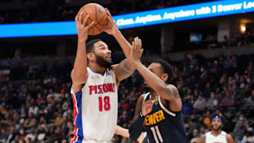 Cory Joseph #18 of the Detroit Pistons goes up for a layup against Monte Morris #11 of the Denver Nuggets during the first quarter at Ball Arena on January 23, 2022 in Denver, Colorado. NOTE TO USER: User expressly acknowledges and agrees that, by downloading and or using this photograph, User is consenting to the terms and conditions of the Getty Images License Agreement. (Photo by Ethan Mito/Clarkson Creative/Getty Images)