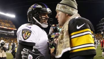 Nov 2, 2014; Pittsburgh, PA, USA; Baltimore Ravens quarterback Joe Flacco (5) and Pittsburgh Steelers quarterback Ben Roethlisberger (right) shake hands after their game at Heinz Field. The Steelers won 43-23. Mandatory Credit: Charles LeClaire-USA TODAY Sports