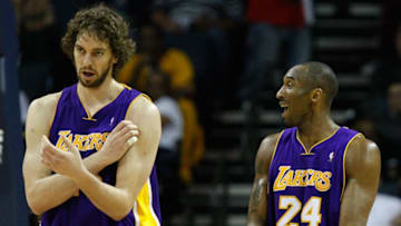 CHARLOTTE, NC - MARCH 31: Teammates Pau Gasol (Photo by Streeter Lecka/Getty Images)