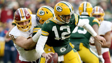 GREEN BAY, WISCONSIN - DECEMBER 08: Matthew Ioannidis #98 of the Washington Redskins sacks Aaron Rodgers #12 of the Green Bay Packers in the fourth quarter at Lambeau Field on December 08, 2019 in Green Bay, Wisconsin. (Photo by Dylan Buell/Getty Images)