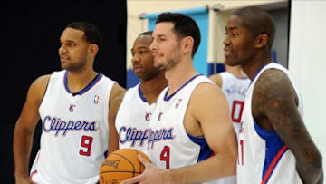 Sep 30, 2013; Playa Vista, CA, USA; Los Angeles Clippers shooting guard Jared Dudley (9), shooting guard Willie Green (34), guard J.J. Redick (4) and guard Jamal Crawford (11) during a photo session during media day at the Los Angeles Clippers Training Facility. Mandatory Credit: Jayne Kamin-Oncea-USA TODAY Sports