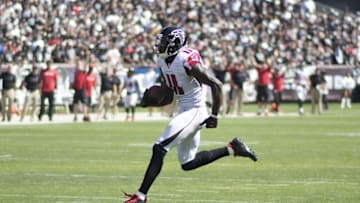 September 18, 2016; Oakland, CA, USA; Atlanta Falcons wide receiver Julio Jones (11) scores a touchdown against the Oakland Raiders during the second quarter at Oakland Coliseum. Mandatory Credit: Kyle Terada-USA TODAY Sports