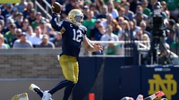 SOUTH BEND, INDIANA - SEPTEMBER 14: Ian Book #12 of the Notre Dame Fighting Irish passes the football in the second quarter against the New Mexico Lobos at Notre Dame Stadium on September 14, 2019 in South Bend, Indiana. (Photo by Quinn Harris/Getty Images)
