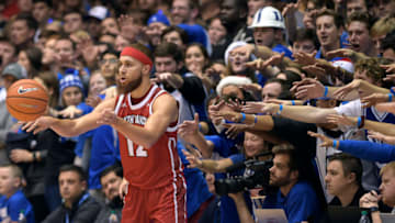 DURHAM, NC - DECEMBER 02: Cameron Crazies and fans of the Duke Blue Devils try to distract Trey Burch-Manning #12 of the South Dakota Coyotes at Cameron Indoor Stadium on December 2, 2017 in Durham, North Carolina. (Photo by Lance King/Getty Images)