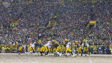 Dec 22, 2013; Green Bay, WI, USA; Green Bay Packers quarterback Matt Flynn (10) drops back to pass during the second quarter against the Pittsburgh Steelers at Lambeau Field. Mandatory Credit: Jeff Hanisch-USA TODAY Sports