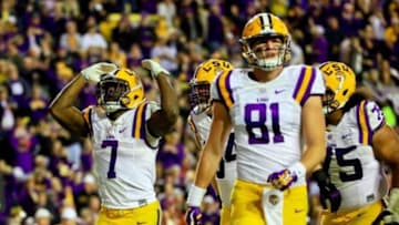 Nov 14, 2015; Baton Rouge, LA, USA; LSU Tigers running back Leonard Fournette (7) celebrates after a touchdown against the Arkansas Razorbacks during the second half of a game at Tiger Stadium. Arkansas defeated LSU 31-14. Mandatory Credit: Derick E. Hingle-USA TODAY Sports