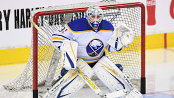 Mar 18, 2022; Calgary, Alberta, CAN; Buffalo Sabres goalie Dustin Tokarski (31) warms up against the Calgary Flames at Scotiabank Saddledome. Mandatory Credit: Candice Ward-USA TODAY Sports