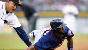 May 17, 2016; Detroit, MI, USA; Minnesota Twins center fielder Danny Santana (39) dives back to first safe around the tag by Detroit Tigers first baseman Miguel Cabrera (24) in the third inning at Comerica Park. Mandatory Credit: Rick Osentoski-USA TODAY Sports