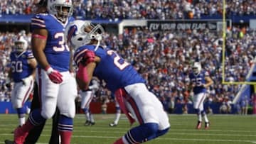 Oct 12, 2014; Orchard Park, NY, USA; Buffalo Bills running back Fred Jackson (22) celebrates his second half touchdown against the New England Patriots at Ralph Wilson Stadium. New England beats Buffalo 37 to 22. Mandatory Credit: Timothy T. Ludwig-USA TODAY Sports