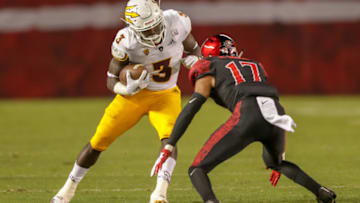 SAN DIEGO, CA - SEPTEMBER 15: Eno Benjamin #3 of the Arizona State Sun Devils runs with the ball in the first half against Ron Smith #17 of the San Diego State Aztecs at SDCCU Stadium on September 15, 2018 in San Diego, California. (Photo by Kent Horner/Getty Images)