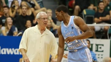 Nov 18, 2016; Honolulu, HI, USA; North Carolina Tar Heels head coach Roy Williams speaks to guard Kenny Williams (24) during the first half against the Hawaii Warriors at the Stan Sheriff Center. Mandatory Credit: Marco Garcia-USA TODAY Sports