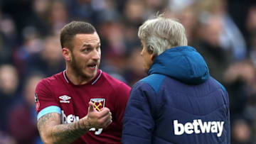LONDON, ENGLAND - JANUARY 05: Marko Arnautovic of West Ham United argues with Manuel Pellegrini, Manager of West Ham United after being substitute during the FA Cup Third Round match between West Ham United and Birmingham City at The London Stadium on January 5, 2019 in London, United Kingdom. (Photo by Alex Morton/Getty Images)