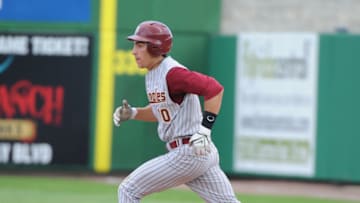 CLEARWATER, FL - FEBRUARY 24: Infielder Justin Gonzalez #10 of the Florida State Seminoles runs to second base against the Philadelphia Phillies February 24, 2011 at Bright House Field in Clearwater, Florida. (Photo by Al Messerschmidt/Getty Images)