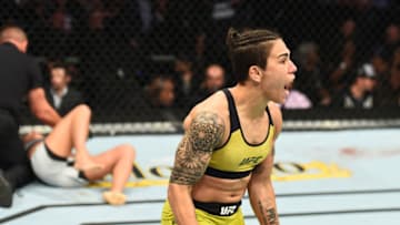 DALLAS, TX - SEPTEMBER 08: (R-L) Jessica Andrade of Brazil celebrates after knocking out Karolina Kowalkiewicz of Poland in their women's strawweight fight during the UFC 228 event at American Airlines Center on September 8, 2018 in Dallas, Texas. (Photo by Josh Hedges/Zuffa LLC/Zuffa LLC via Getty Images)