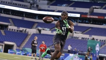 Feb 27, 2016; Indianapolis, IN, USA; Ole Miss Rebels wide receiver Laquon Treadwell catches a pass during the 2016 NFL Scouting Combine at Lucas Oil Stadium. Mandatory Credit: Brian Spurlock-USA TODAY Sports