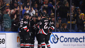 Dec 29, 2022; Buffalo, New York, USA; Buffalo Sabres right wing Kyle Okposo (21) celeb rates his third goal of the game against the Detroit Red Wings during the third period at KeyBank Center. Mandatory Credit: Timothy T. Ludwig-USA TODAY Sports